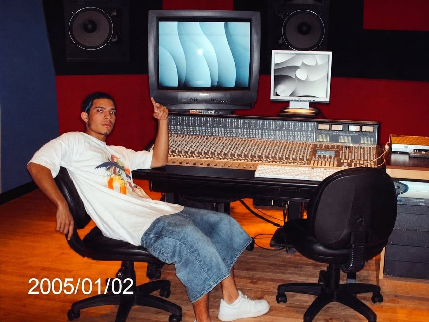 Abel J. Fernandez working in a recording studio control room
