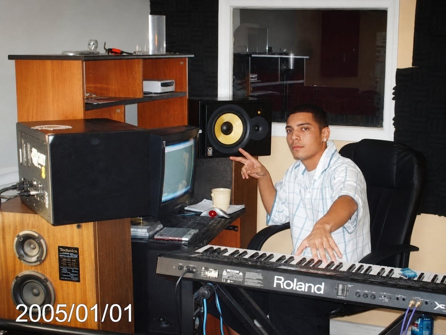 Abel J. Fernandez in a studio control room with production monitors
